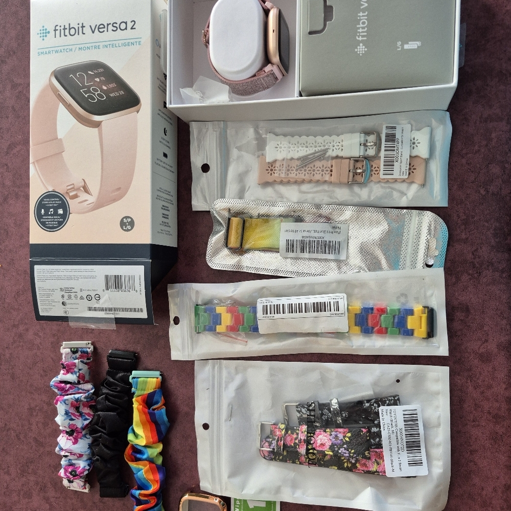 Fitbit Smartwatch with 15 Watch Straps, 2 Covers & Charger